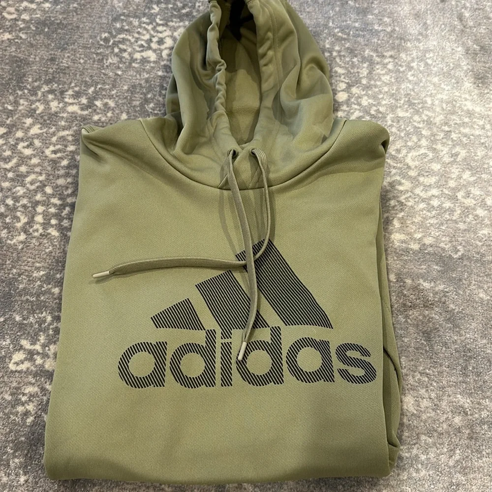 ADIDAS NWOT HOODIE MENS SIZE L ARMY GREEN FROM SAKS. NWOT